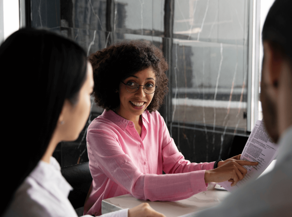 Recruiter explaining background check procedures to candidates in an interview setting to ensure POPIA compliance.